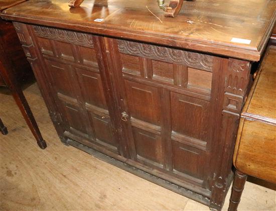 Panelled oak 2 door cabinet(-)